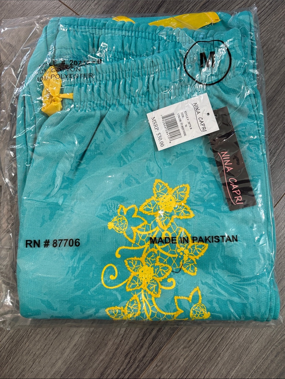Nina Capri Teal Pants with Yellow Floral Embroidery